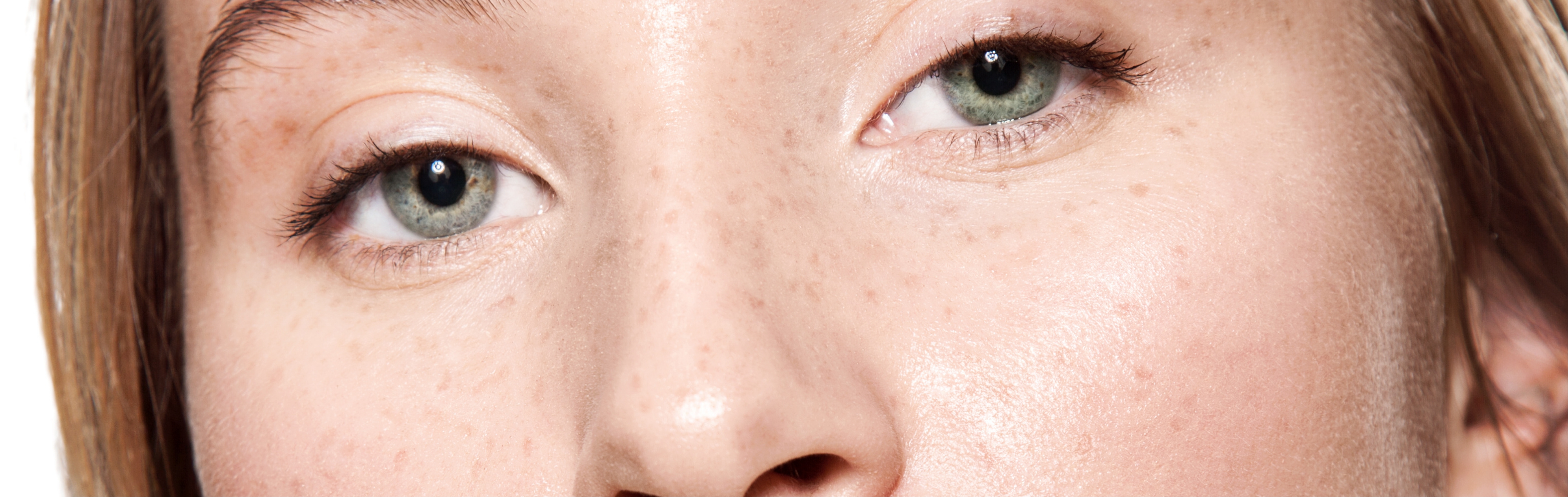 Southern Face and Body lady facing the camera close up of her eyes with smooth skin