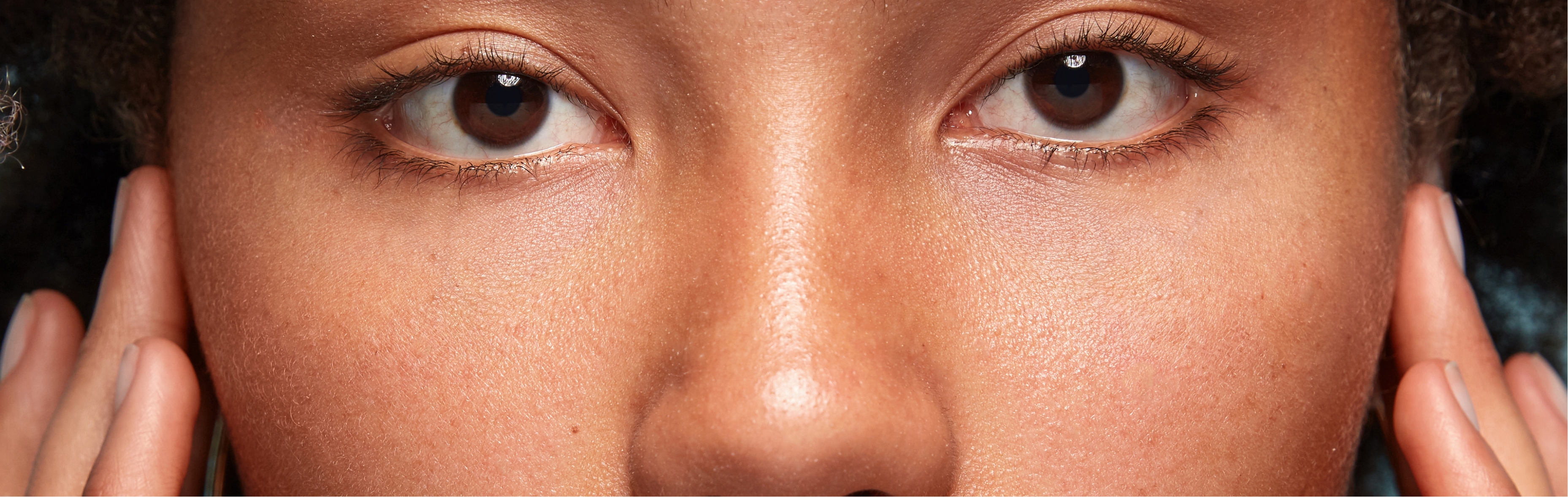 Southern Face and Body lady facing the camera close up of her face with smooth skin
