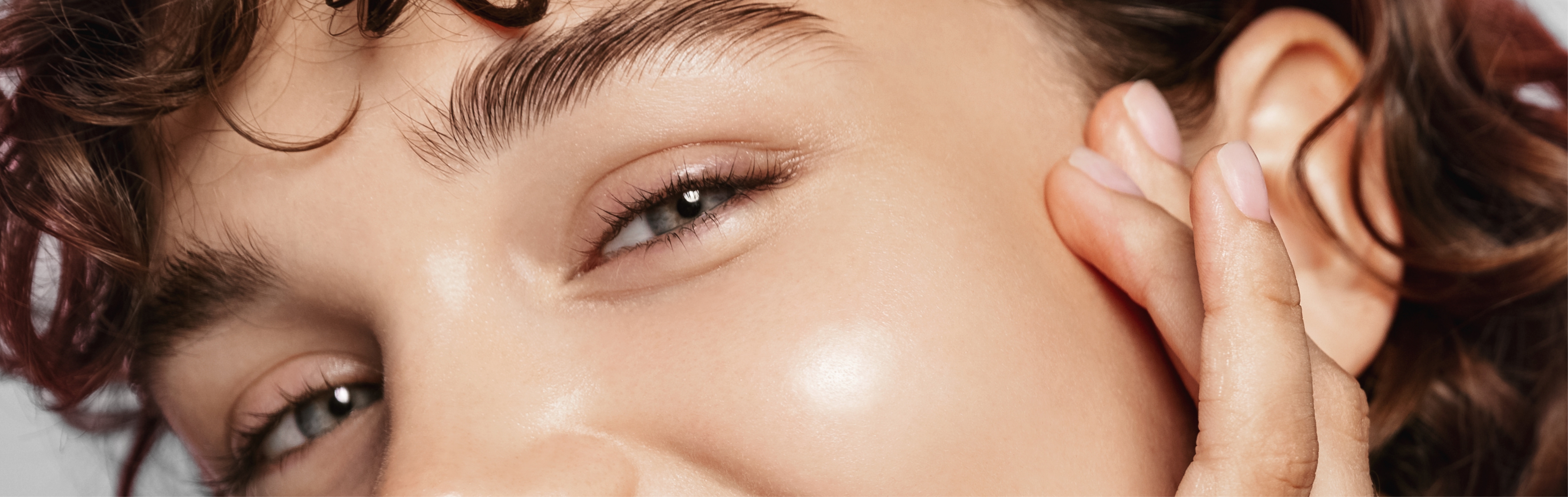 Southern Face and Body lady facing the camera close up of her eyes with smooth skin