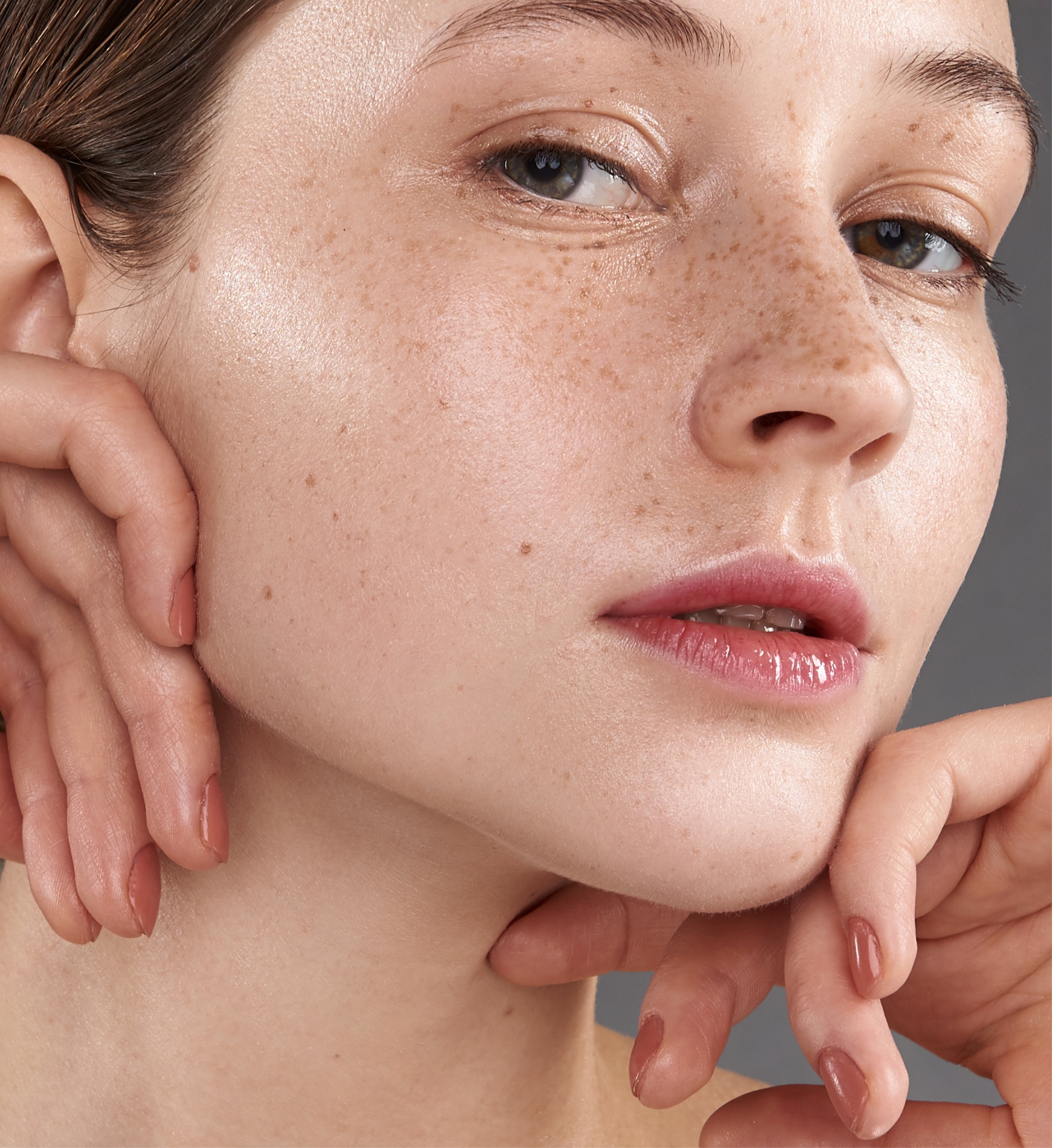 Southern Face and Body lady facing the right close up of her face with smooth skin