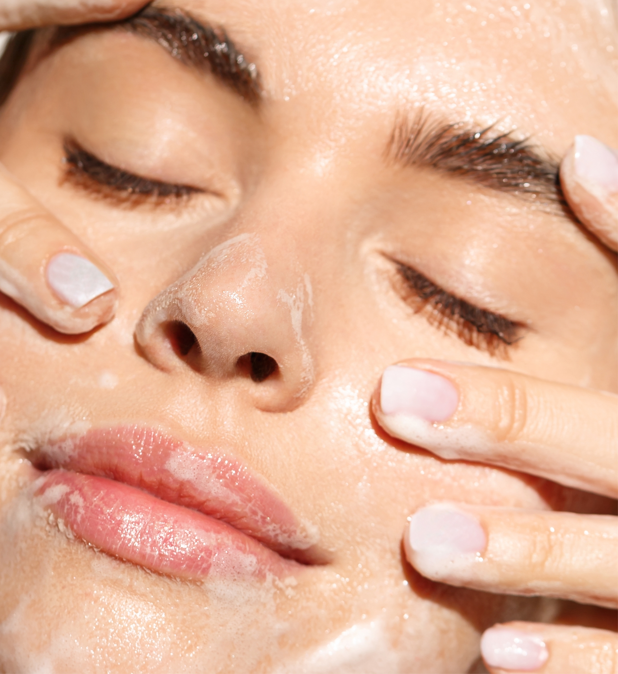 Southern Face and Body lady facing the camera close up of her face with smooth skin getting treatment